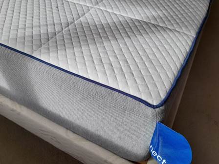 Nectar Sleep Hybrid mattress corner view with bedframe